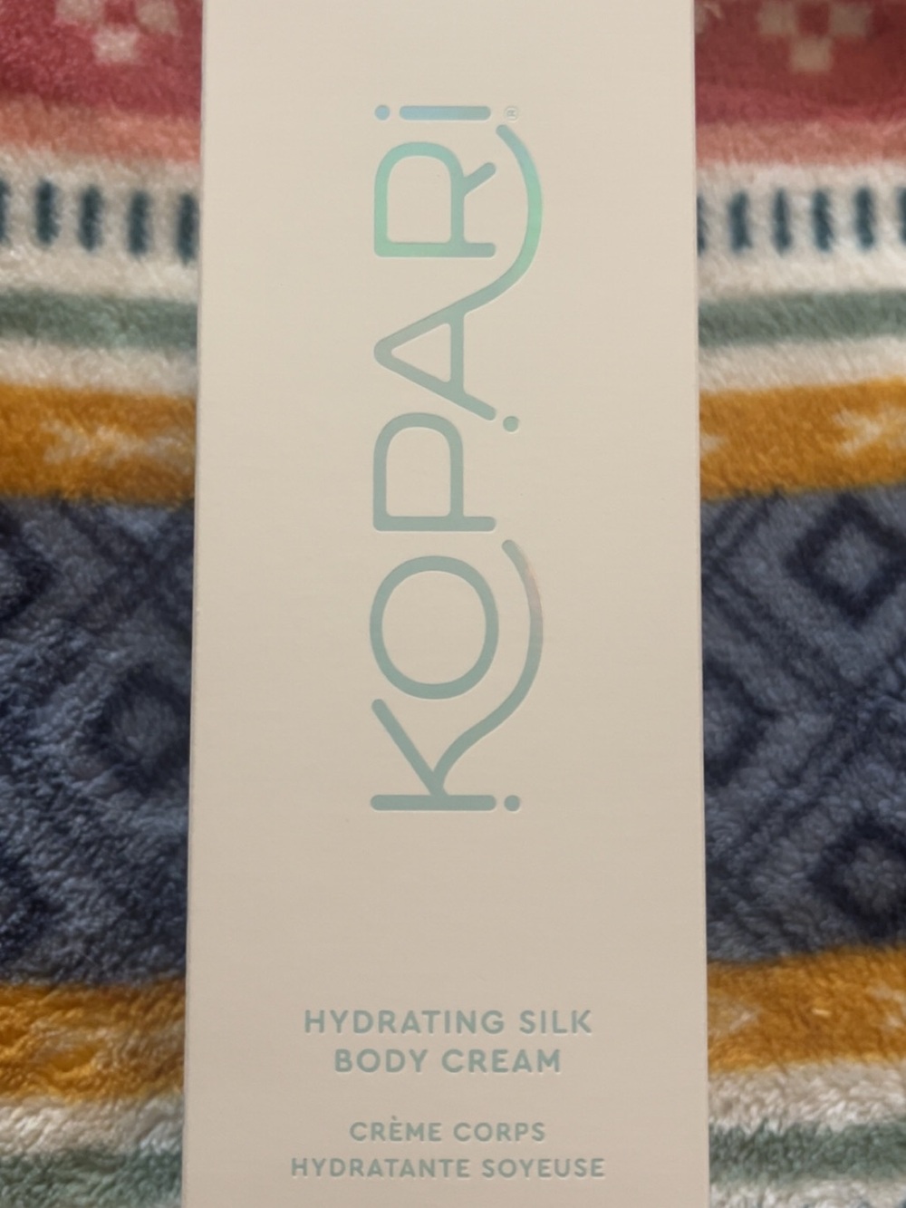 Kopari Hydrating Silk Body Cream - Aqua and White Packaging